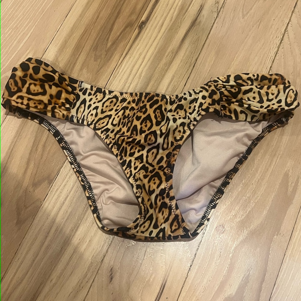 Victoria’s Secret XS leopard swim bottoms.
